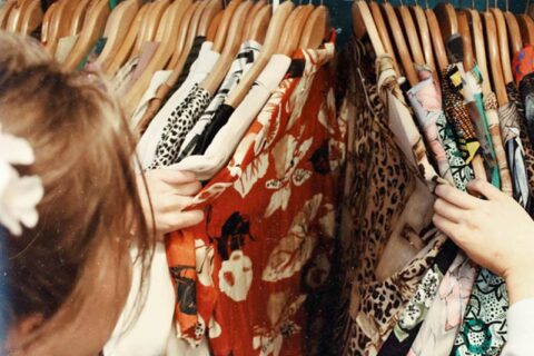 Women Selecting clothes from the closet